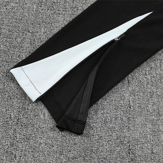 25/26 Chelsea Black Tracksuit from FootballPrestige.com - Premium Football Kits