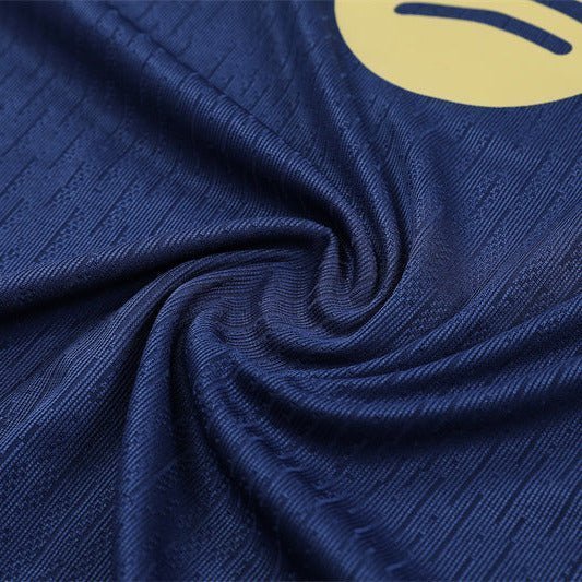 25/26 FC Barcelona Half Zip Training Blue/Purple Tracksuit from FootballPrestige.com - Premium Football Kits