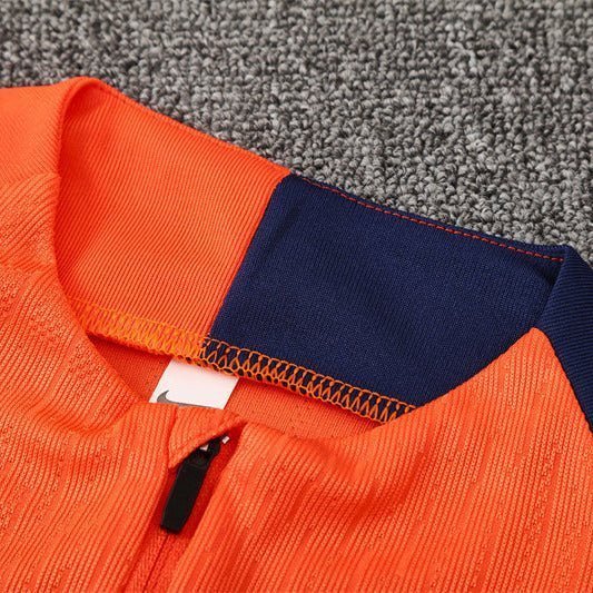 25/26 FC Barcelona Training Orange/Blue Tracksuit from FootballPrestige.com - Premium Football Kits
