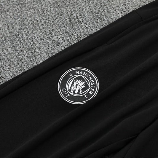 25/26 Manchester City x Asahi Black Kids Size Tracksuit from FootballPrestige.com - Premium Football Kits