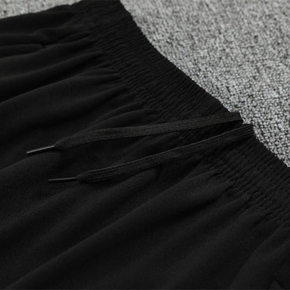 25/26 Manchester City x Asahi Black Tracksuit from FootballPrestige.com - Premium Football Kits