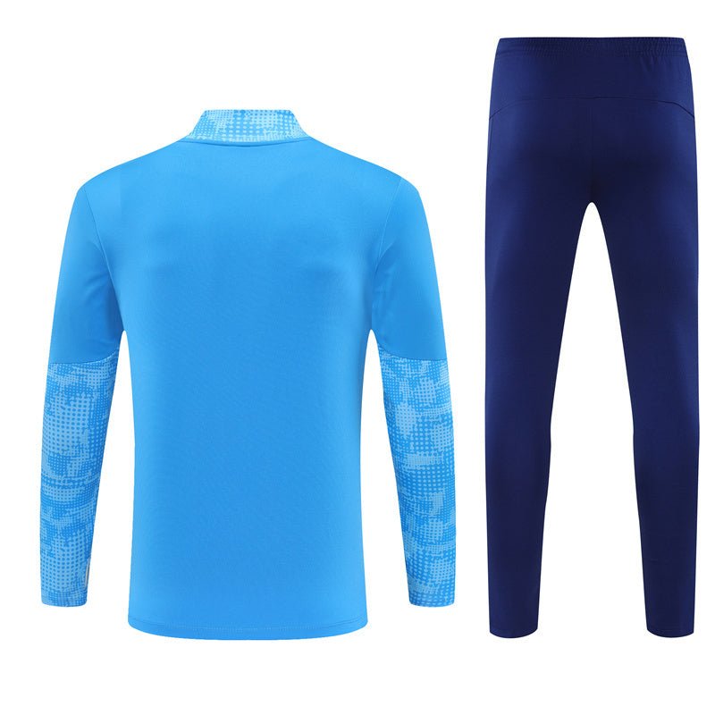 25/26 Manchester City x Asahi Blue Kids Size Tracksuit from FootballPrestige.com - Premium Football Kits