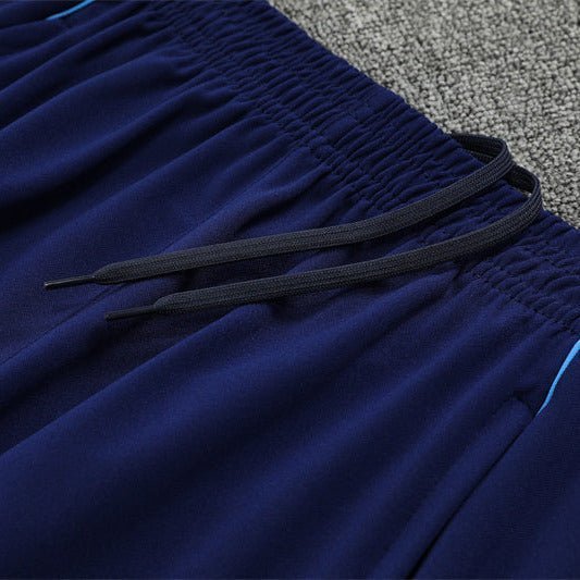 25/26 Real Madrid Training Blue Kids Size Tracksuit from FootballPrestige.com - Premium Football Kits