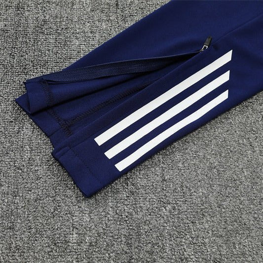25/26 Real Madrid Training Blue Kids Size Tracksuit from FootballPrestige.com - Premium Football Kits