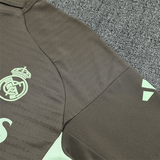 25/26 Real Madrid Training Dark Olive Tracksuit from FootballPrestige.com - Premium Football Kits