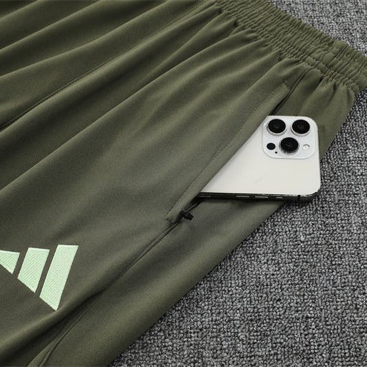 25/26 Real Madrid Training Dark Olive Tracksuit from FootballPrestige.com - Premium Football Kits