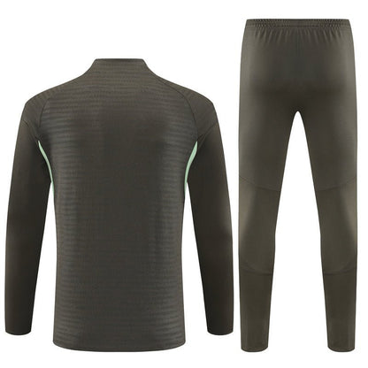 25/26 Real Madrid Training Dark Olive Tracksuit from FootballPrestige.com - Premium Football Kits