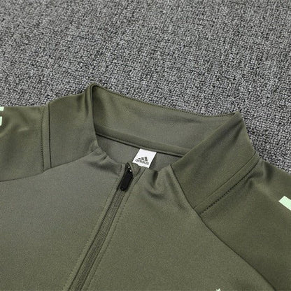 25/26 Real Madrid Training Dark Olive Tracksuit from FootballPrestige.com - Premium Football Kits