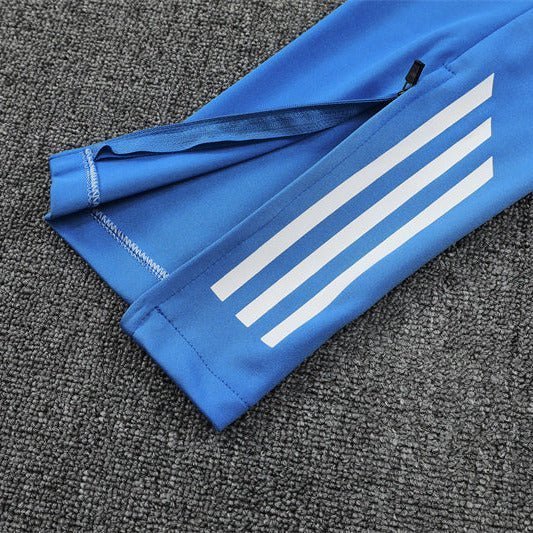 25/26 Real Madrid Training Light Blue Kids Size Tracksuit from FootballPrestige.com - Premium Football Kits