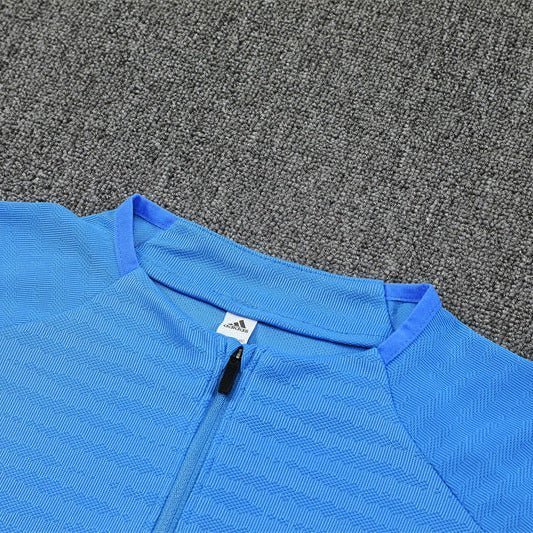 25/26 Real Madrid Training Light Blue Tracksuit from FootballPrestige.com - Premium Football Kits