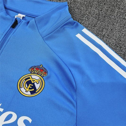 25/26 Real Madrid Training Light Blue Tracksuit from FootballPrestige.com - Premium Football Kits