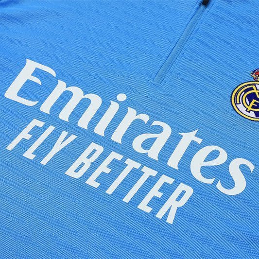 25/26 Real Madrid Training Light Blue Tracksuit from FootballPrestige.com - Premium Football Kits
