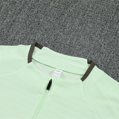 25/26 Real Madrid Training Lime Green Kids Size Tracksuit from FootballPrestige.com - Premium Football Kits