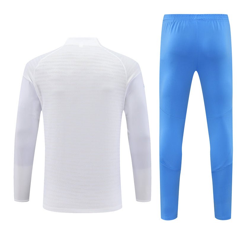 25/26 Real Madrid Training White/Light Blue Kids Size Tracksuit from FootballPrestige.com - Premium Football Kits