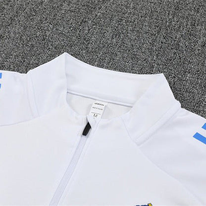 25/26 Real Madrid Training White/Light Blue Kids Size Tracksuit from FootballPrestige.com - Premium Football Kits