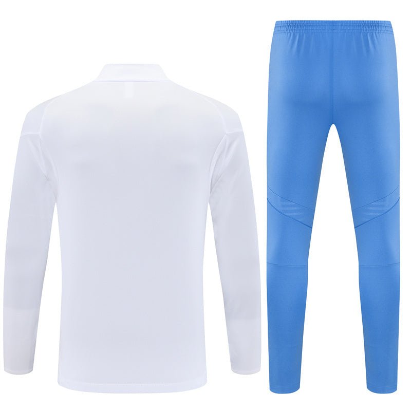 25/26 Real Madrid Training White/Light Blue Tracksuit from FootballPrestige.com - Premium Football Kits