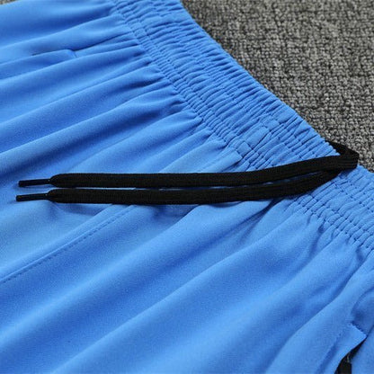25/26 Real Madrid Training White/Light Blue Tracksuit from FootballPrestige.com - Premium Football Kits