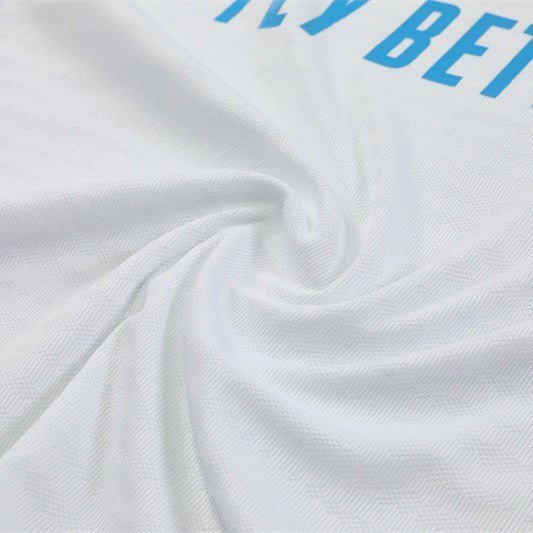 25/26 Real Madrid Training White/Light Blue Tracksuit from FootballPrestige.com - Premium Football Kits