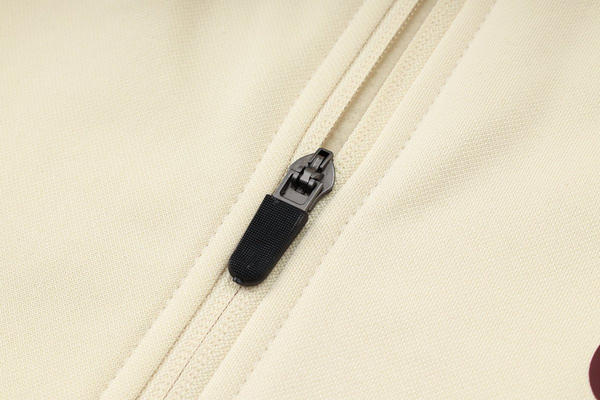 PSG Beige and Dark Blue Premium Tracksuit from FootballPrestige.com - Premium Football Kits