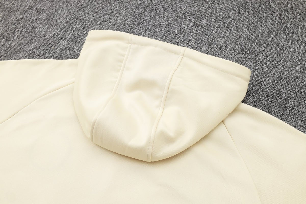 PSG Beige and Dark Blue Premium Tracksuit from FootballPrestige.com - Premium Football Kits
