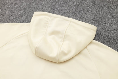 PSG Beige and Dark Blue Premium Tracksuit from FootballPrestige.com - Premium Football Kits