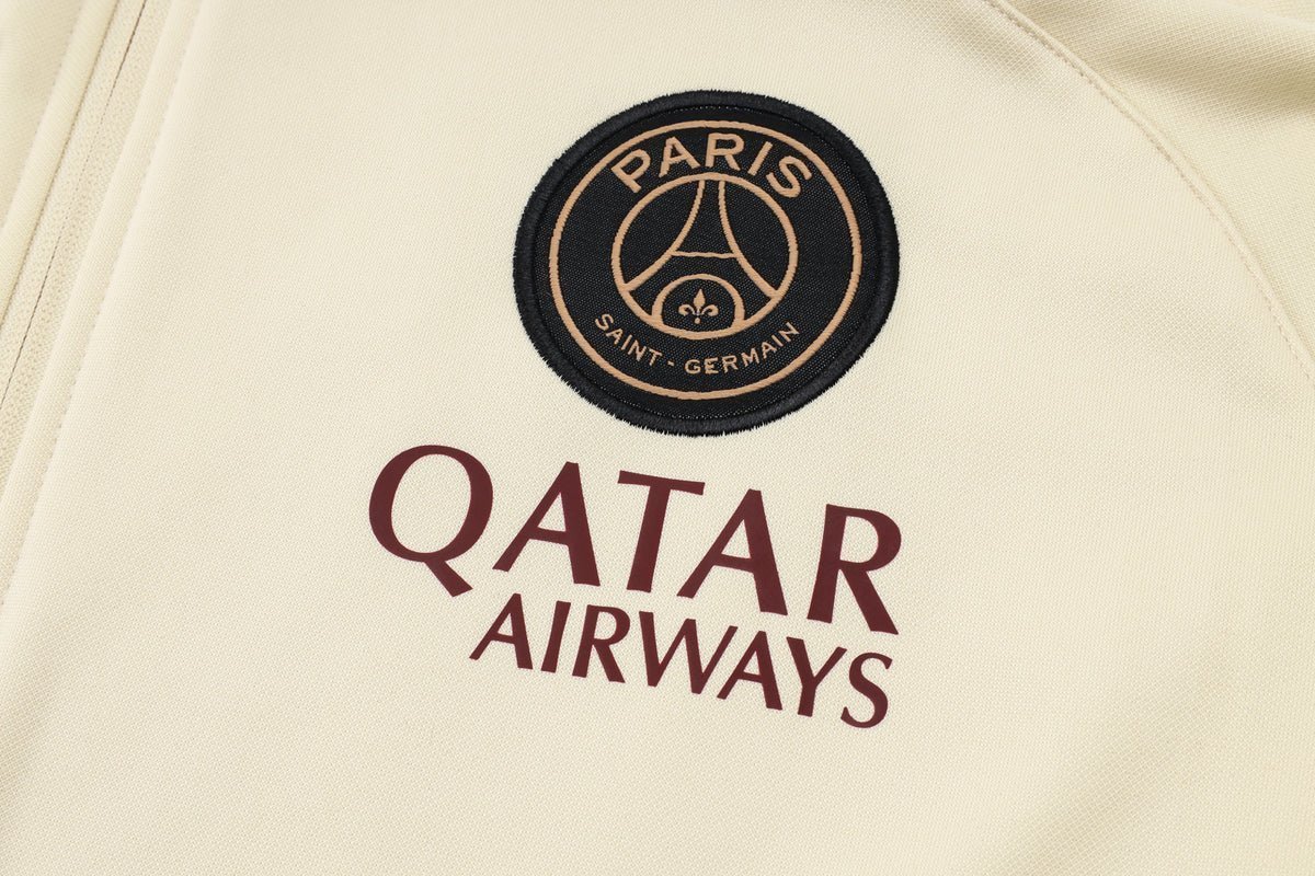 PSG Beige and Dark Blue Premium Tracksuit from FootballPrestige.com - Premium Football Kits