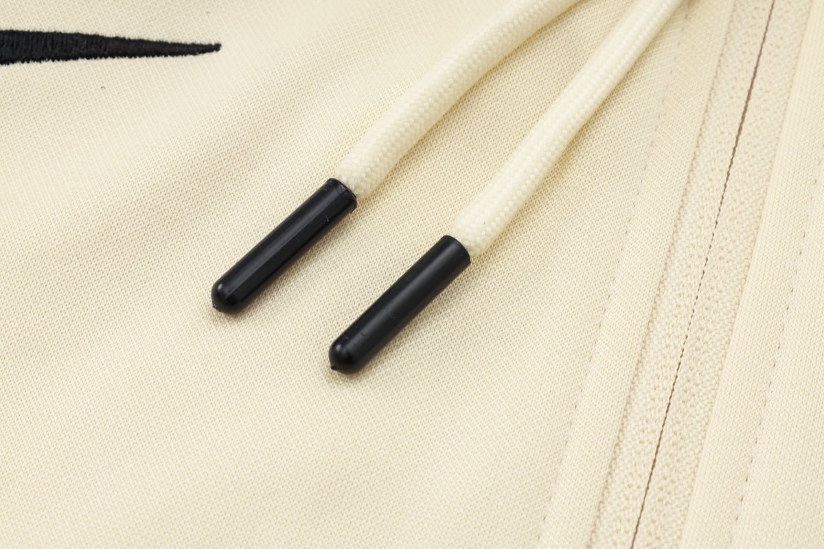 PSG Beige and Dark Blue Premium Tracksuit from FootballPrestige.com - Premium Football Kits