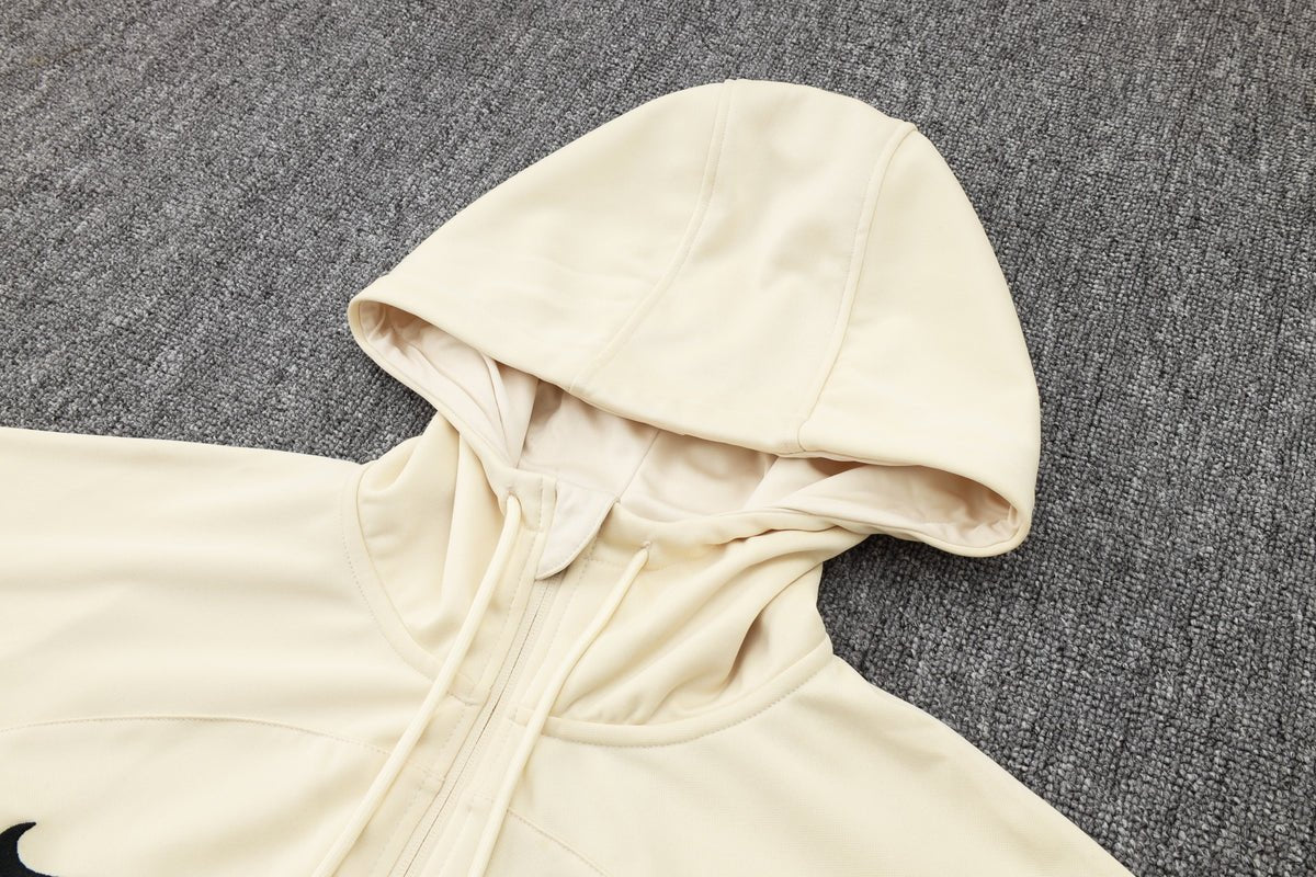 PSG Beige and Dark Blue Premium Tracksuit from FootballPrestige.com - Premium Football Kits