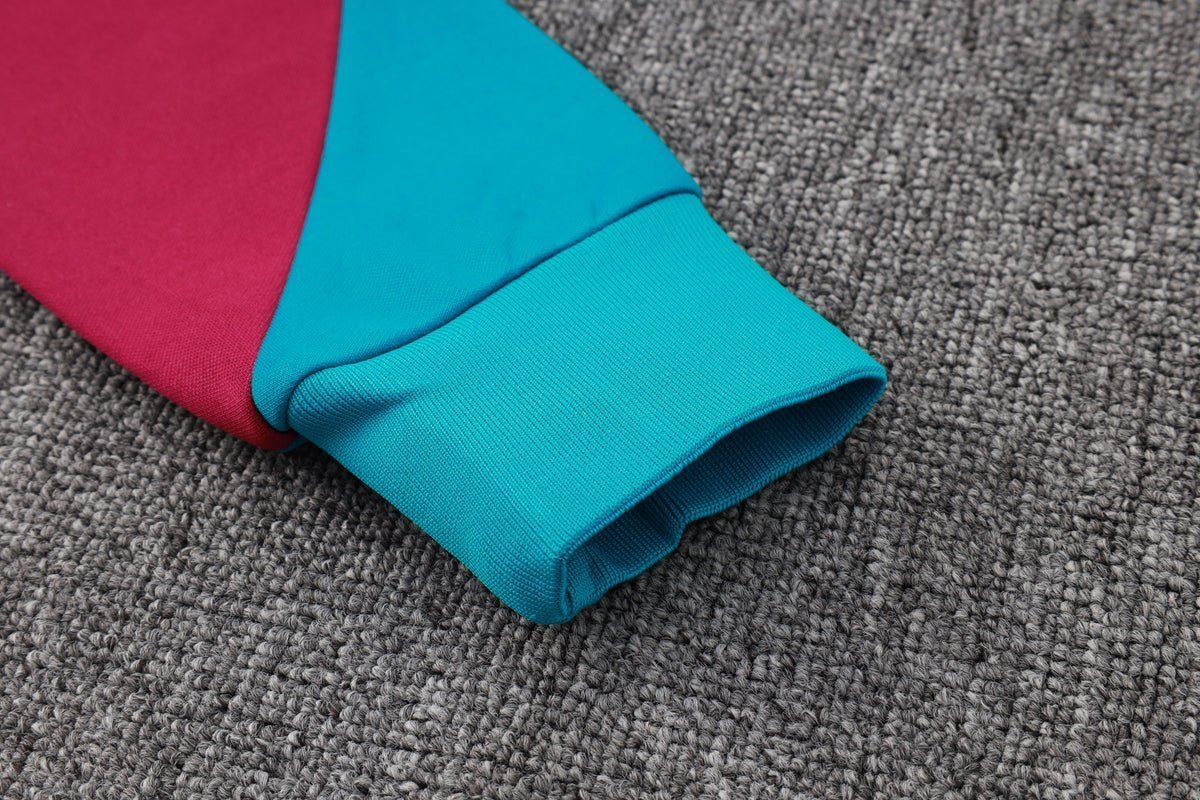 PSG Turquoise and Pink Premium Tracksuit from FootballPrestige.com - Premium Football Kits