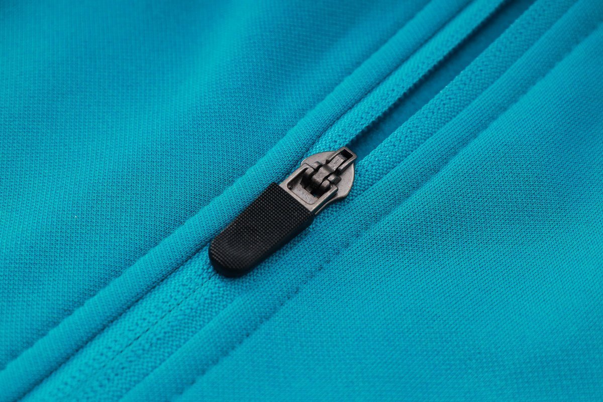 PSG Turquoise and Pink Premium Tracksuit from FootballPrestige.com - Premium Football Kits