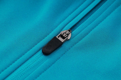 PSG Turquoise and Pink Premium Tracksuit from FootballPrestige.com - Premium Football Kits