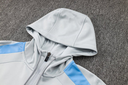 PSG White and Blue Premium Tracksuit from FootballPrestige.com - Premium Football Kits