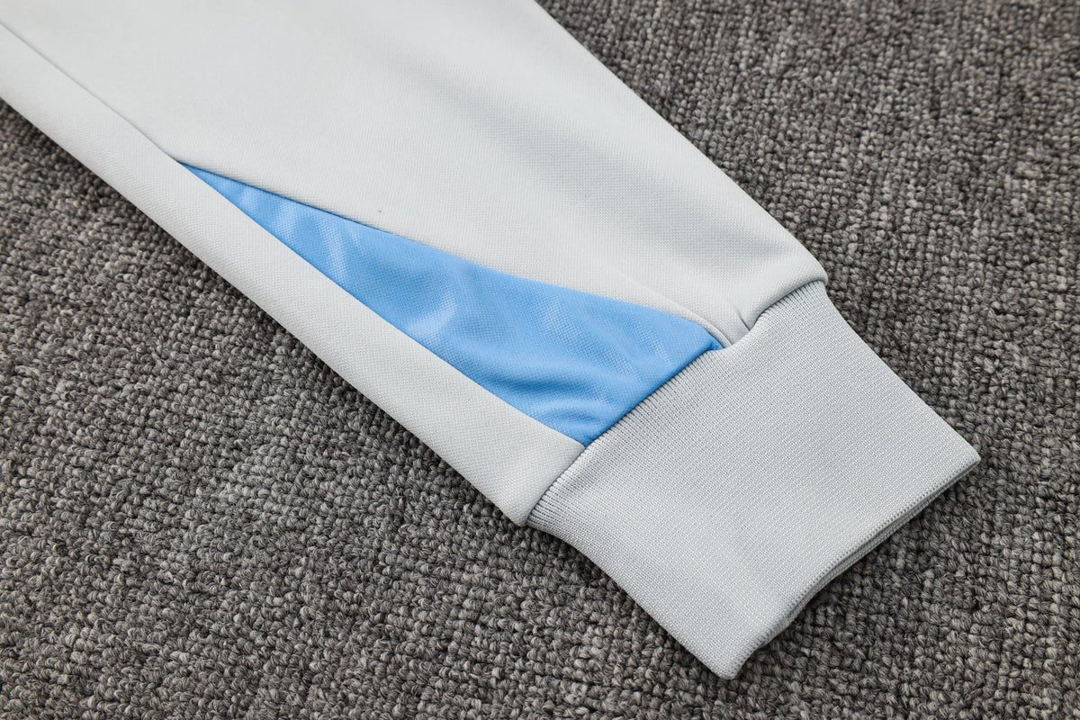 PSG White and Blue Premium Tracksuit from FootballPrestige.com - Premium Football Kits