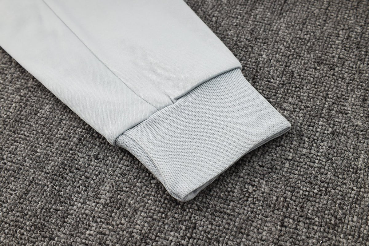 PSG White and Blue Premium Tracksuit from FootballPrestige.com - Premium Football Kits