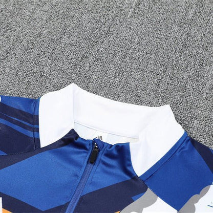 Real Madrid "Azul Reactor" Premium Kids Size Tracksuit from FootballPrestige.com - Premium Football Kits