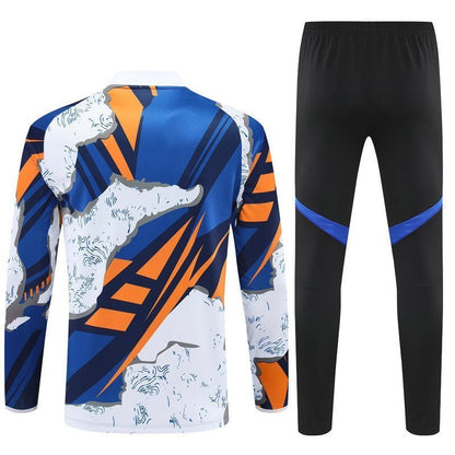 Real Madrid "Azul Reactor" Premium Kids Size Tracksuit from FootballPrestige.com - Premium Football Kits