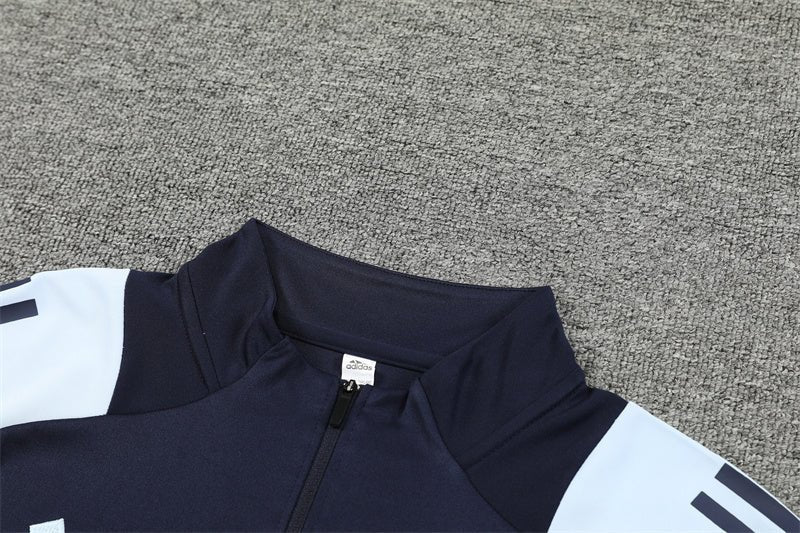 Real Madrid "Curvera" Premium Tracksuit from FootballPrestige.com - Premium Football Kits