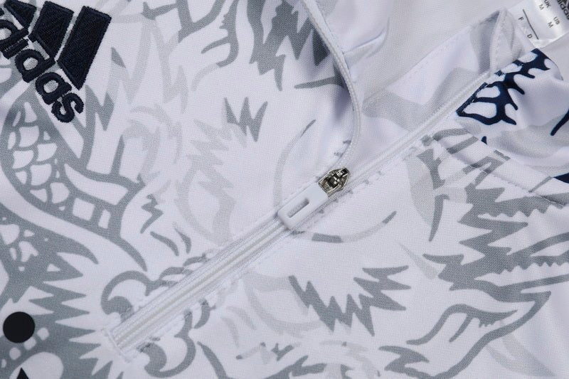 Real Madrid "Dragón Blanco" Premium Tracksuit from FootballPrestige.com - Premium Football Kits