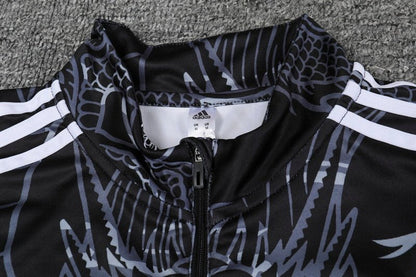 Real Madrid "Dragón Negro" Premium Tracksuit from FootballPrestige.com - Premium Football Kits