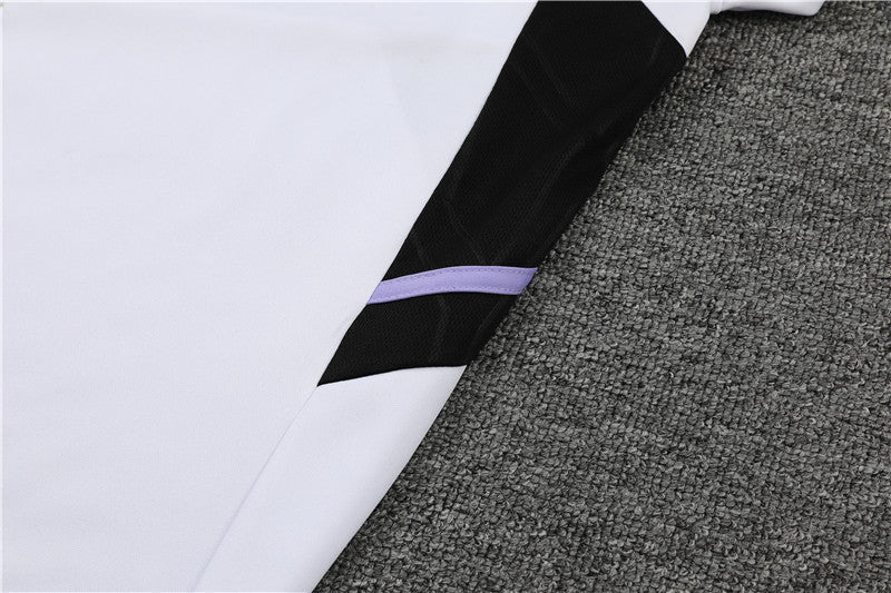 Real Madrid "Momentum" Premium Tracksuit from FootballPrestige.com - Premium Football Kits