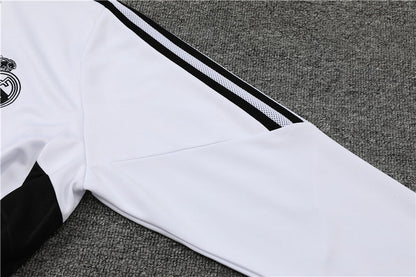 Real Madrid "Momentum" Premium Tracksuit from FootballPrestige.com - Premium Football Kits