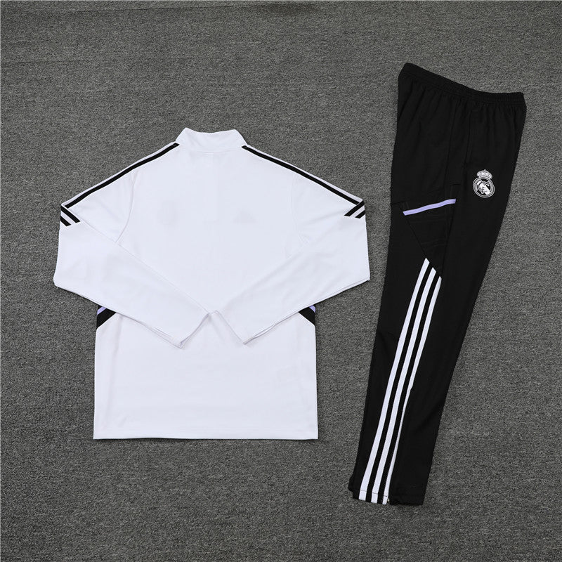 Real Madrid "Momentum" Premium Tracksuit from FootballPrestige.com - Premium Football Kits