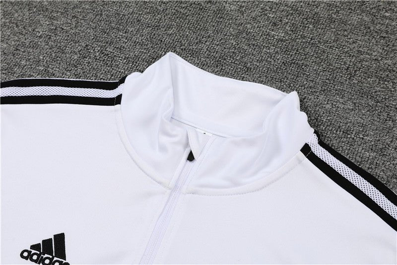 Real Madrid "Momentum" Premium Tracksuit from FootballPrestige.com - Premium Football Kits