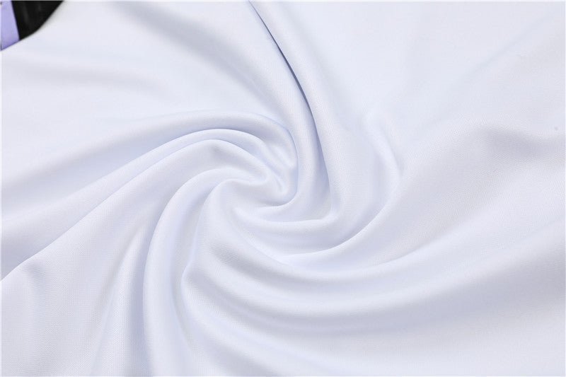 Real Madrid "Momentum" Premium Tracksuit from FootballPrestige.com - Premium Football Kits